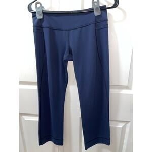 Lululemon.  Size 6 ladies . Navy cropped capris. Excellent condition,